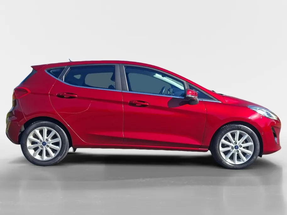Ford Fiesta 1.0 EcoBoost Titanium | Nieuwe Disitributieriem bij aflevering  | Navigatie | Camera | Adaptieve Cruise Control | Voorruitverwarming | B&O | Climate Control