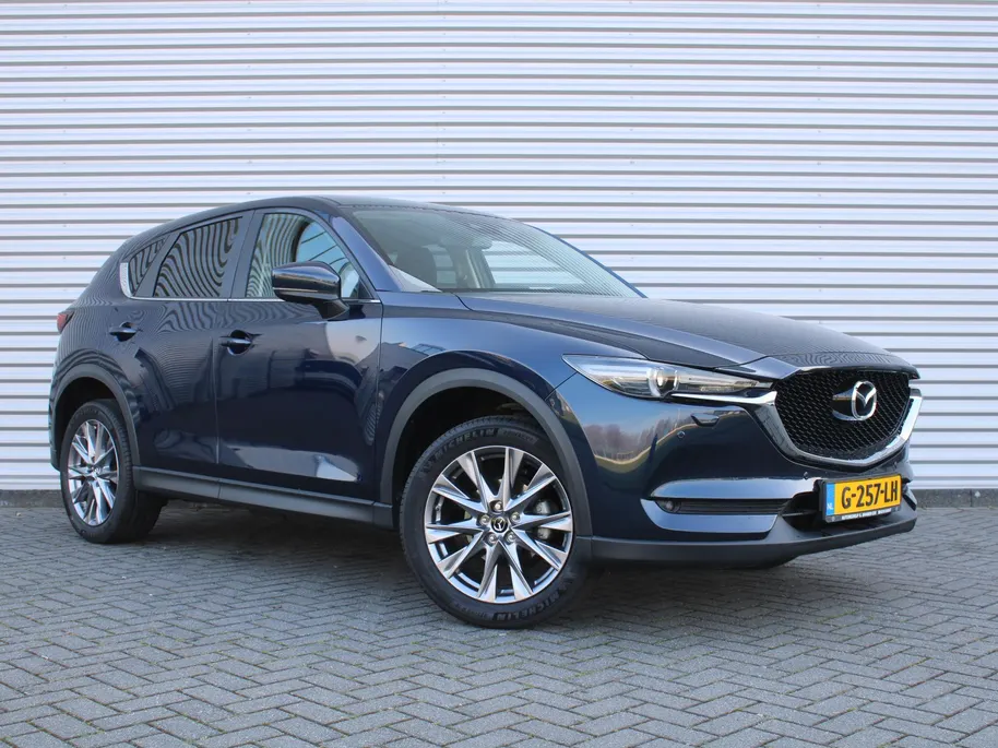 Mazda CX-5 2.0 SkyActiv-G 165 Comfort | Trekhaak | Stoel-/stuurverwarming | Dodehoek detectie | Carplay | Clima | 19' LM | Parkeersensor v+a | LED |