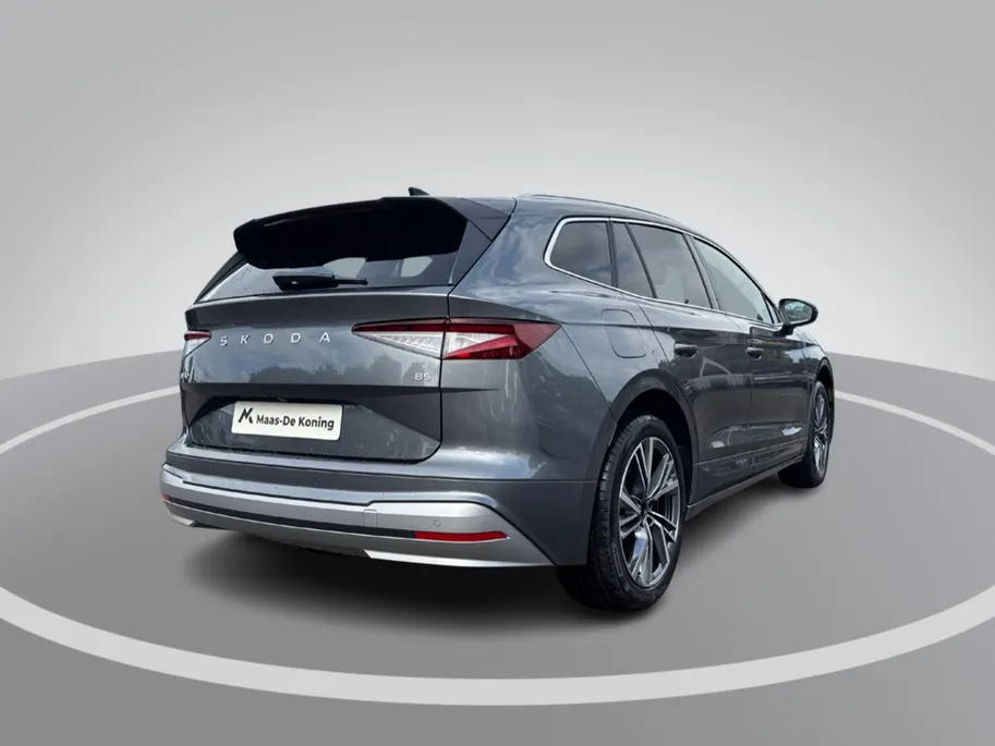 Škoda Enyaq iV Business Edition 85 | 20' inch velgen Neptune | Achterbumper en dorpels in carosseriekleur | Elektrisch wegklapbare trekhaak | 2.500,- inruilpremie!!