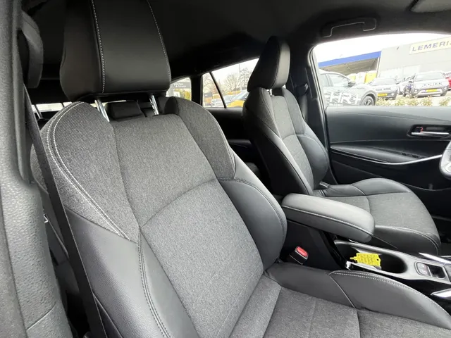 Toyota Corolla Touring Sports 1.8 Hybrid Dynamic | Trekhaak | Nieuwe All Seasons