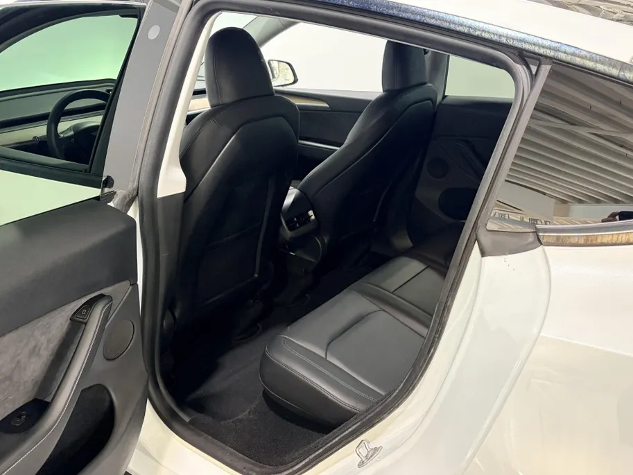 Tesla Model Y 351PK Long Range AWD 75 kWh Automaat | 1e eigenaar | Panoramadak | Basic Autopilot | 360 Camera | Stoelverwarming | Leder | Elektrische Achterklep | Elektrische Stoelen | Full LED |