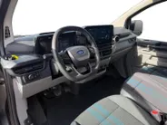 Ford Transit Custom 300 2.0 TDCI L2H1 Sport | Automaat | Adapt. Cruise control | BLIS | Winter pack | Elektr. bestuurdersstoel | Parkeersensoren voor en achter | Achteruitrijcamera | Navigatie | Apple carplay & Android auto | 18' lichtmetalen velgen | Bovag garantie |