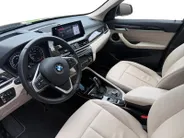 BMW X1 sDrive18i Business Edition Plus | Trekhaak | Leder | Navi | Stoelverwarming | Head-Up Display | Ambient Lighting | NL AUTO | Cruise Control | Climate Control | 12 maanden Bovag garantie |
