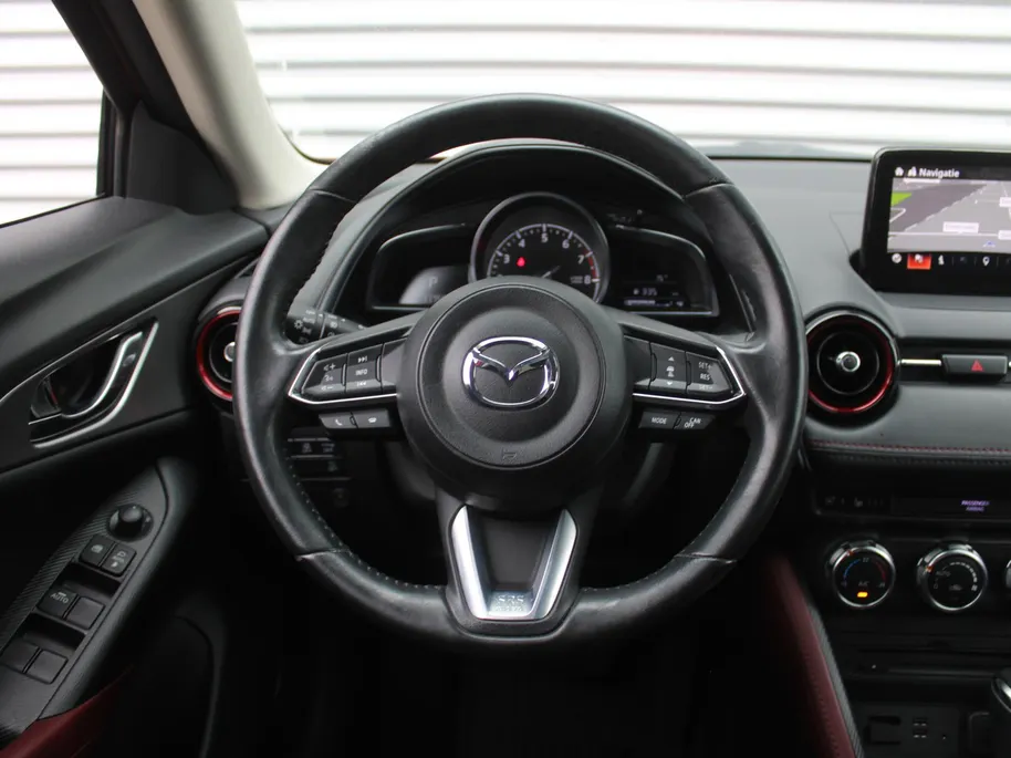 Mazda CX-3 2.0 SkyActiv-G 120 GT-M | Stuur-/stoelverwarming | Leer | Dodehoek detectie | Camera | Bose | HUD | LED | 18' LM | Cruise adapt. | Navi | Clima |