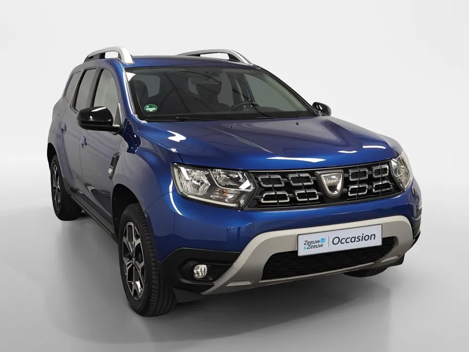 Dacia Duster 1.0 TCe Bi-Fuel Serie Limitee 15th Anniversary NAVI AIRCO CAMERA PARKEERSENSOREN CRUISE CONTROLE LM VELGEN HOGE INSTAP  ZEER MOOIE AUTO OP LPG 12 MAANDEN GARANTIE
