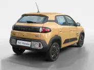 Dacia Spring Extreme 65 26.8 kWh AUTOMAAT AIRCO CAMERA CRUISE CONTROLE APPLE CARPLAY ANDROID AUTO ZEER MOOIE AUTO DEMONSTRATIEAUTO VRAAG NAAR DE KMSTAND