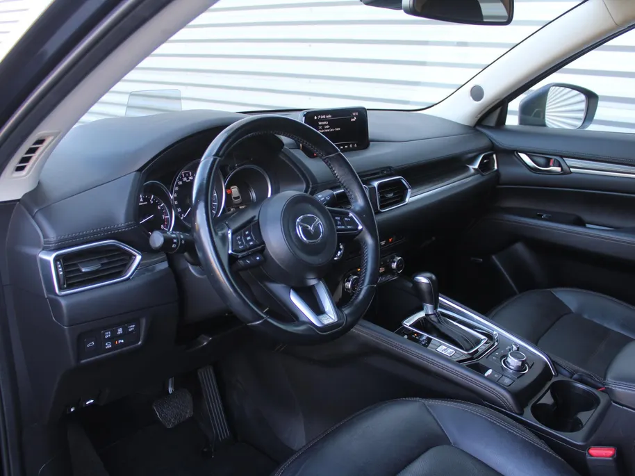 Mazda CX-5 2.0 SkyActiv-G 165 Skylease Luxury | Trekhaak | 360 Camera | Leer | Stuur-/stoelverwarming | HUD | Bose | Elek. stoelverstelling | 19' LM | All seasons |