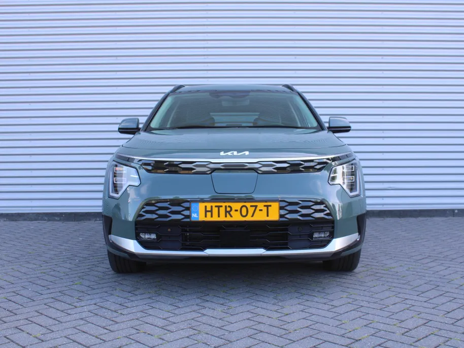 Kia Niro EV Air 64.8 kWh | Stuur-/stoelverwarming | Camera | Cruise adapt. | 17' LM | Elekt. stoelverstelling | Dodehoek detectie | LED | Clima |