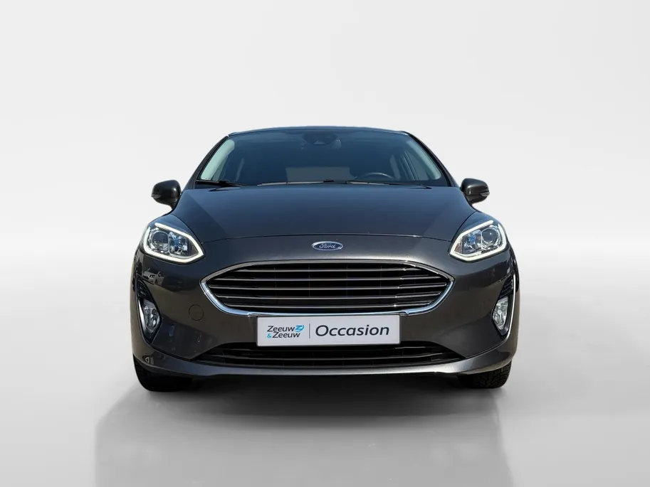 Ford Fiesta 1.0 EcoBoost Titanium | Dealer onderhouden | Winter pack | Parkeersensor achter | Apple carplay & Android auto | Navigatie via carplay | Cruise control | Elektr. inklapbare buitenspiegel | Privacy glas |