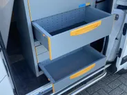 Ford Transit Custom 300 2.0 TDCI L1H2 Trend 130pk Automaat Store Van laadruimteinrichting - Speciale dak Imperiaal - 2x Schuifdeur - Trekhaak -Comfort Laadschot