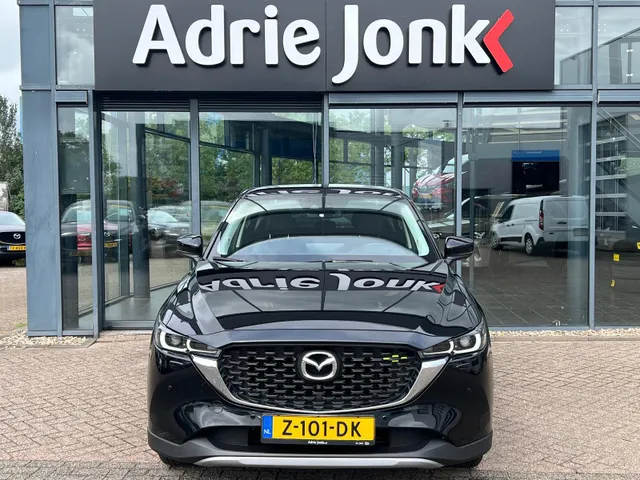 Mazda CX-5 2.0 e-SkyActiv-G M Hybrid 165 Newground AUTOMAAT | TREKHAAK | 360gr. CAMERA | NAVIGATIE | APPLE + ANDROID | HEAD-UP DISPLAY | 19'LM VELGEN | EL.A. KLEP |