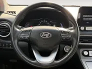 Hyundai Kona EV Fashion 64 kWh 204PK | Warmtepomp | SOH 100 % | Navigatie | Apple Carplay & Android Auto | Adaptive cruise control | Climate control | Head-up display | Parkeersensoren achter | Trekhaak |