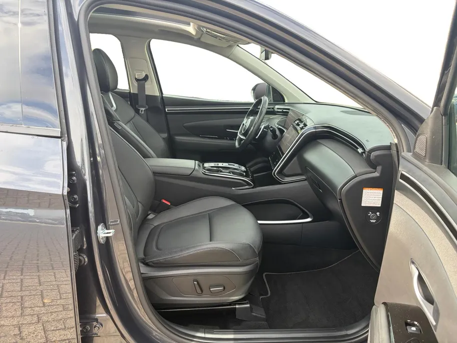 Hyundai Tucson 1.6 T-GDI HEV Premium Sky | Full options! | Elek. stoelverstelling | Schuif- kanteldak | Leder | Stoelverwarming en koeling