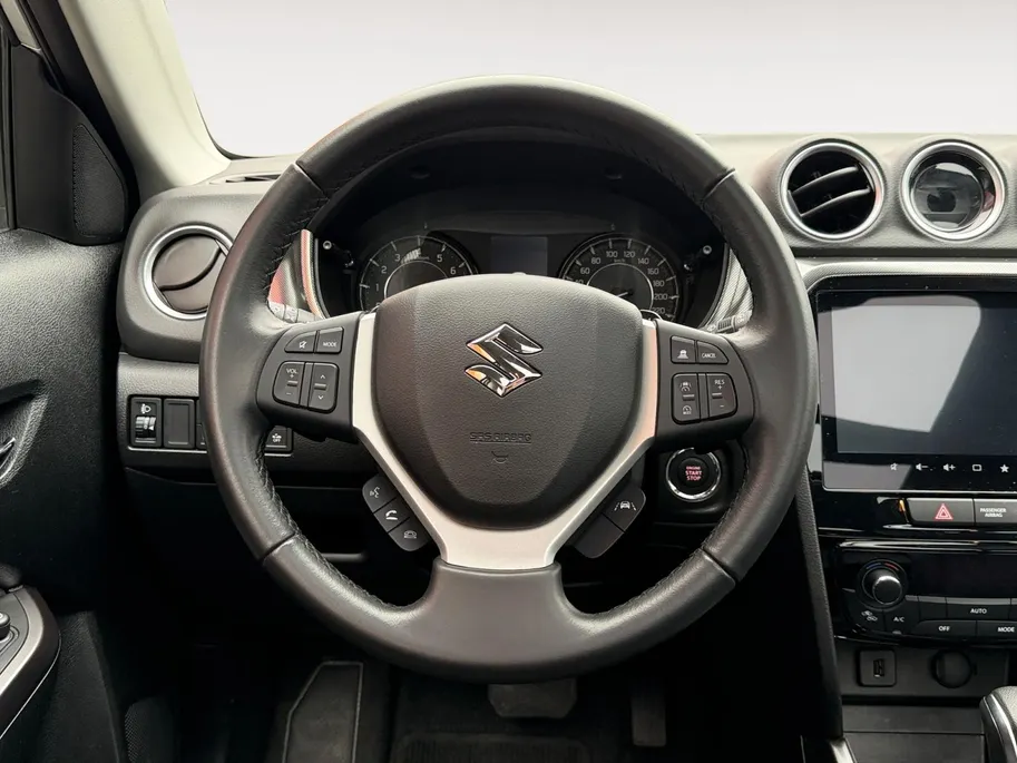 Suzuki Vitara 1.5 Hybrid Style 116PK AUTOMAAT | Parkeer sensoren| Metallic lak| 4 seizoen banden| Camera| Schuif en kanteldak| Navigatie| Stoel verwarming| Adaptieve cruise control