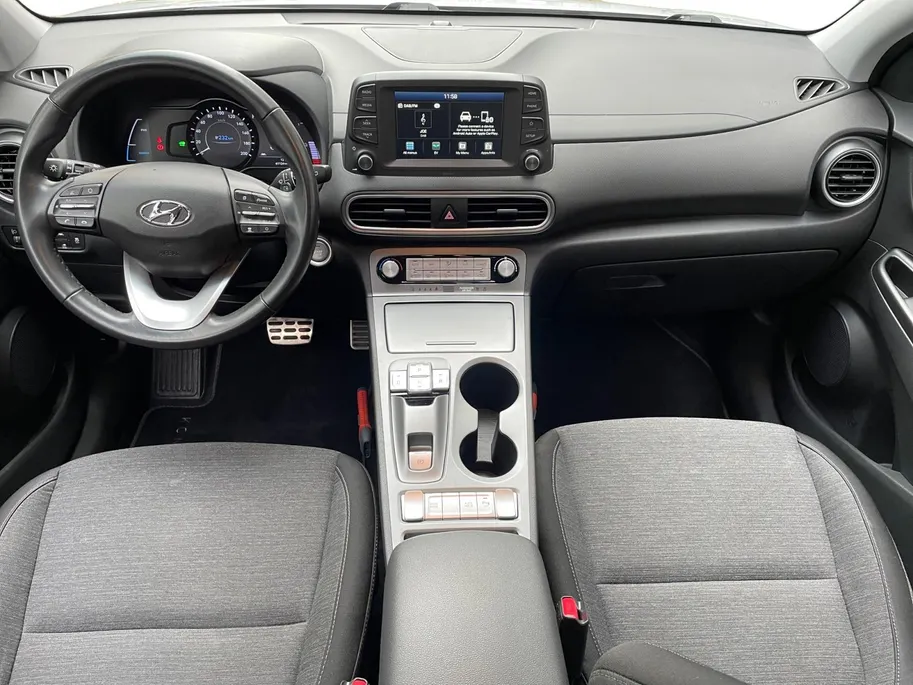 Hyundai Kona EV Comfort 64 kWh | Warmtepomp | 100% SOH | Adaptive cruise control | Apple Carplay & Android Auto | Achteruitrijcamera | Parkeersensoren achter | Keyless entry | DAB radio |