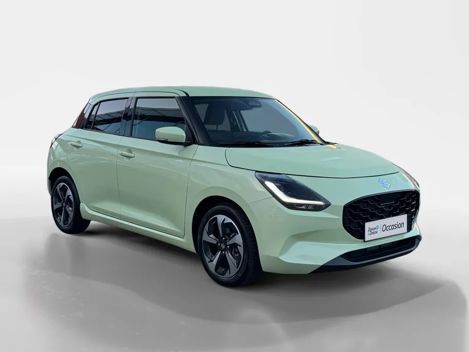 Suzuki Swift 1.2 Style Smart Hybrid | Apple Carplay/Android Auto | Achteruitrij Camera | Adaptive Cruise Control | All-Season | BLISS | LED | LMV 16' | Stoelverwarming |