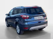 Ford Kuga 1.5 EcoBoost Titanium | Wegklapbare trekhaak| Navigatie| elec achterklep| Parkeersensoren| 4 seizoen banden| Stuur verwarming| Stoel verwarming| Vooruit verwarming| Climate Control | Zeer netjes!