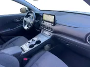 Hyundai Kona EV Fashion 64 kWh | Warmtepomp | Navigatie | Apple Carplay & Android Auto | Adaptive cruise control | Open dak | Head-up display | Achteruitrijcamera |