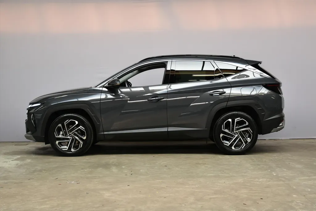 Hyundai Tucson 1.6 T-GDi HEV Aut. Premium Sky |Schuifdak |Beige Leder .