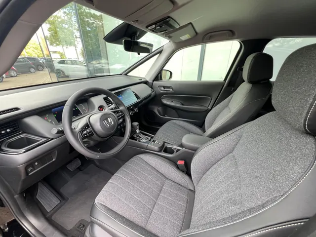 Honda Jazz 1.5 e:HEV Advance NIEUW | FULL HYBRID | APPLE CARPLAY | ANDROID AUTO | ACHTERUITRIJCAMERA | STOEL + STUURVERWARMING | NAVIGATIE |