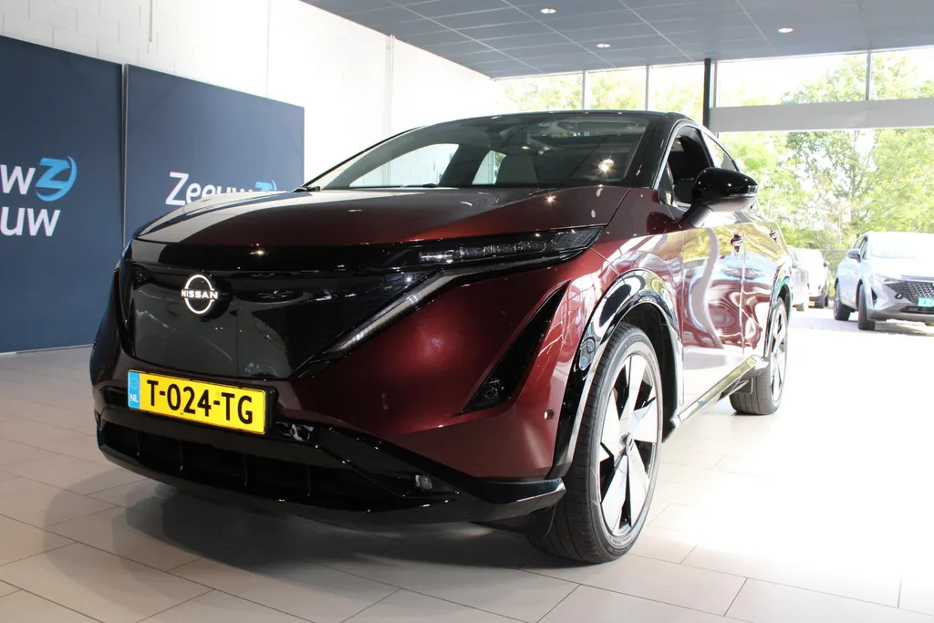 Nissan ARIYA Evolve 66 kWh | 20 inch wielen | Ceramic coating |22 kW ingebouwde lader | Electrische stoel en stuur verstelling | Navigatie | Stoel geheugen | shuif/kanteldak | Stoel verwarming en verkoeling | Zeer mooie auto |