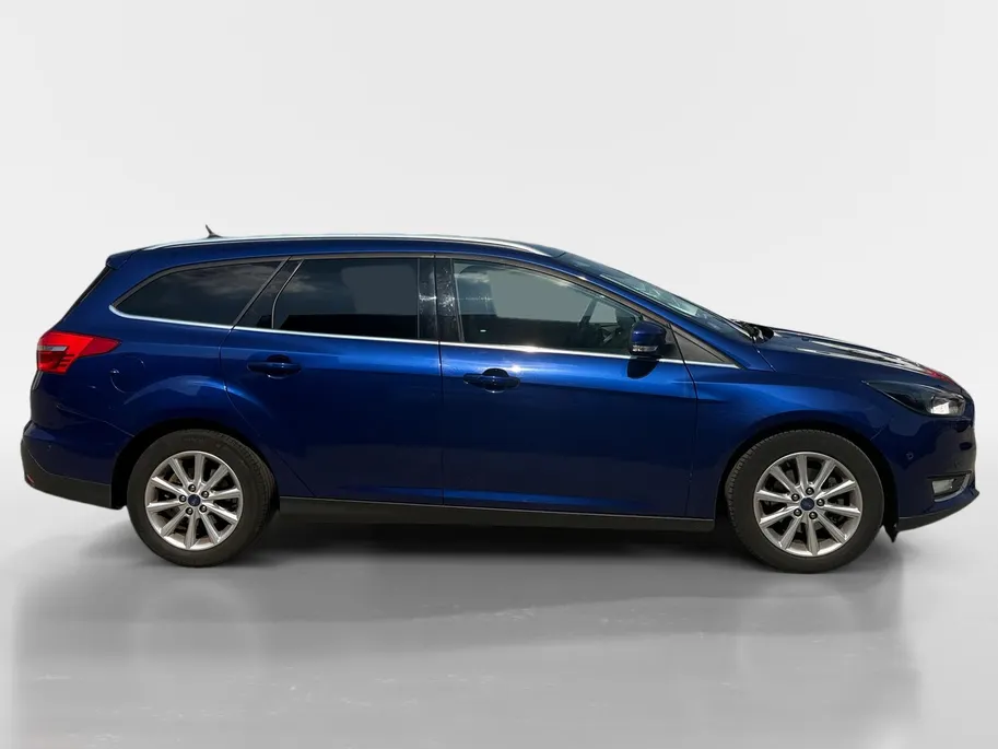 Ford Focus Wagon 1.0 Titanium 125 pk | Airco | Navigatie | LM Velgen | Dealer onderhouden!