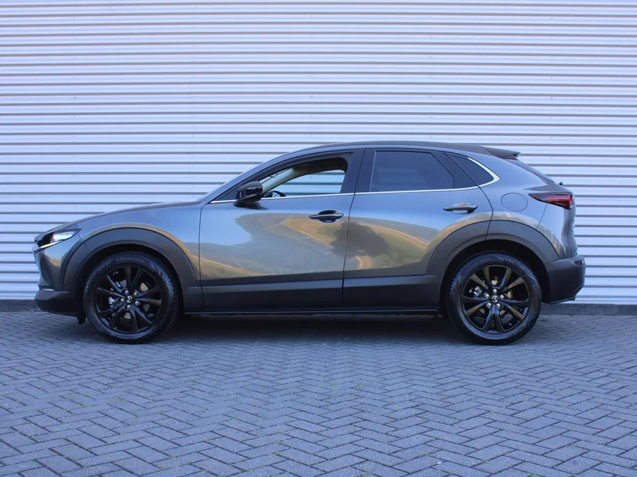 Mazda CX-30 2.0 e-SkyActiv-X M Hybrid Homura | Stoel-/stuurverwarming | Camera | 18' LM | LED | HUD | Dodehoek detectie | Elek. achterklep | Cruise adapt. |