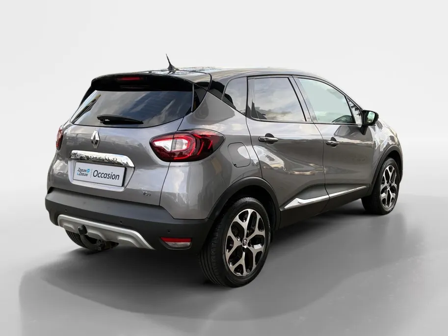 Renault Captur 120PK TCe Intens | Trekhaak | 1200KG Trekgewicht | Stoelverwarming |  Parkeersensor | Lichtmetalen Velgen | Licht & Regen Sensor | Cruise Control | Climate Control | Navigatie |