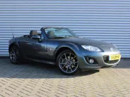 Mazda MX-5 Roadster Coupé 1.8 Hanabi | Stoelverwarming | Leer | Navi | 17" LM | Cruise | Clima | Hardtop | Nieuwstaat | Ned. auto |