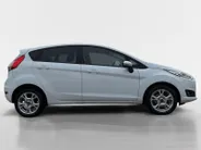 Ford Fiesta 1.0 Style Ultimate | Dealer onderhouden | NL auto | Navigatie | Parkeersensoren voor en achter | Achteruitrijcamera | 15' lichtmetalen velgen | Airco | Cruise control | Bluetooth | Privacy glas | Bovag garantie |