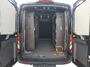 Ford Transit 350 2.0 TDCI L3H2 Trail 165 pk handgeschakeld | BPM VRIJ | Adaptive Cruise control | Navigatiesysteem | Raptor Gril | Zwarte treeplanken | LM velgen gloss black | Houten kasten links en rechts | Dakdragers met laddersysteem
