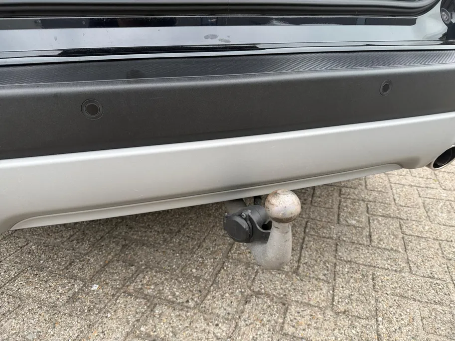 Ford Kuga 2.5 PHEV Titanium | Dealer Onderhouden | SOH 91% | El. Trekhaak | Adapt. Cruise Control | BLISS | Achteruitrijcamera | Parkeersensoren voor & achter | Winterpakket | All Season Banden