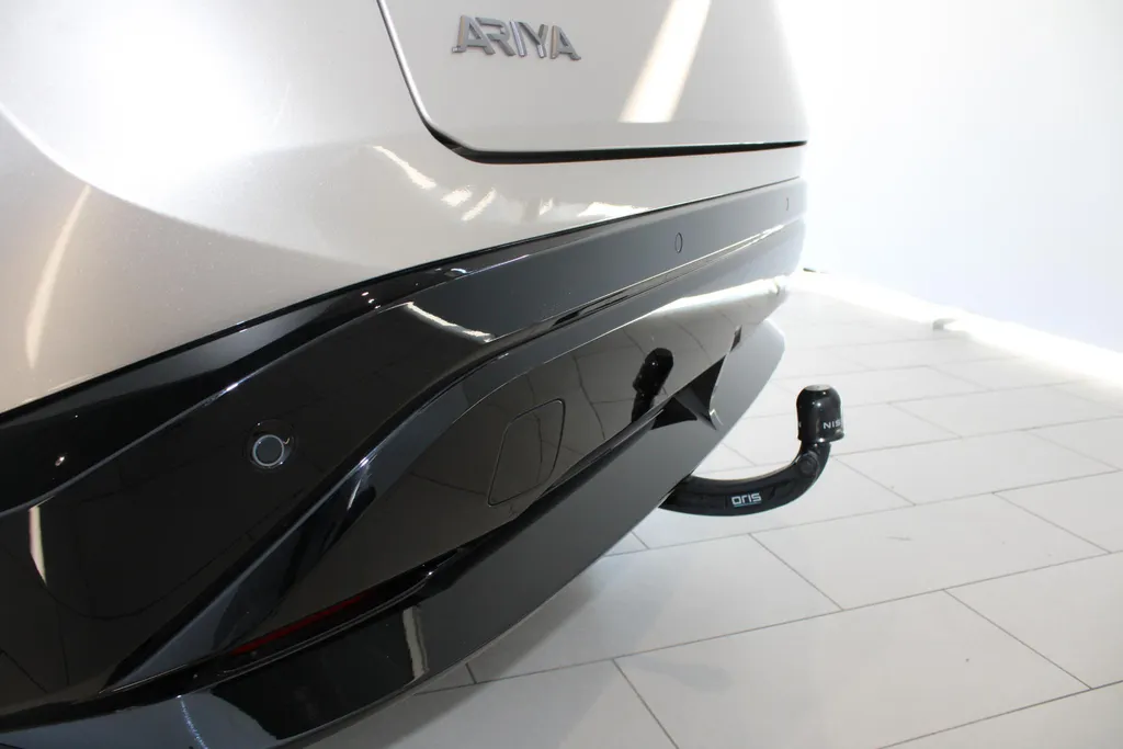 Nissan ARIYA Evolve 66 kWh | 22KW Lader| Afneembare trekhaak| Apple carplpay& Android auto| 360grd Camera| Stoelverwarming en verkoeling| Elektrisch verstelbare stoelen| Luxe bekleding| Dealer onderhouden|