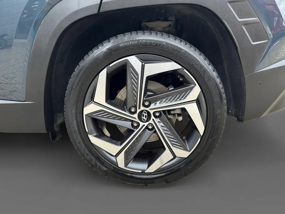 Hyundai Tucson 1.6 T-GDI HEV Premium Sky + Winterbanden! | 1650kg trekgewicht | Navi | 360 Camera | Stoel+ stuurverwarming | Elek. stoelverstelling