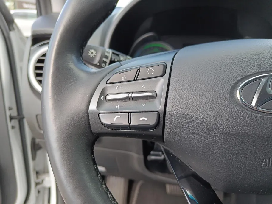 Hyundai Kona 1.6 GDI HEV Premium | Trekhaak | Apple Carplay/Android Auto | Adaptive cruise control | Dodenhoek herkenning | Leren bekleding