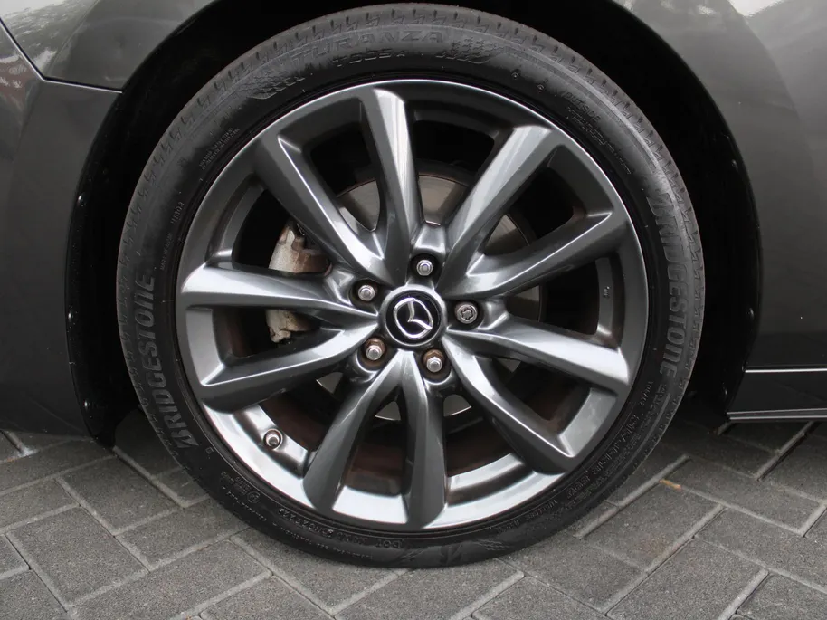Mazda 3 2.0 e-SkyActiv-G M Hybrid 122 Luxury | Trekhaak | Stuur-/stoelverwarming | Leer | 360 Camera | Stoelgeheugen | 18' LM | HUD | LED | Cruise adapt. |