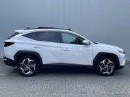 Hyundai Tucson 1.6 T-GDi HEV 230pk Aut. Premium Sky / Navigate + Camera / Schuif-kanteldak / Full Option! /