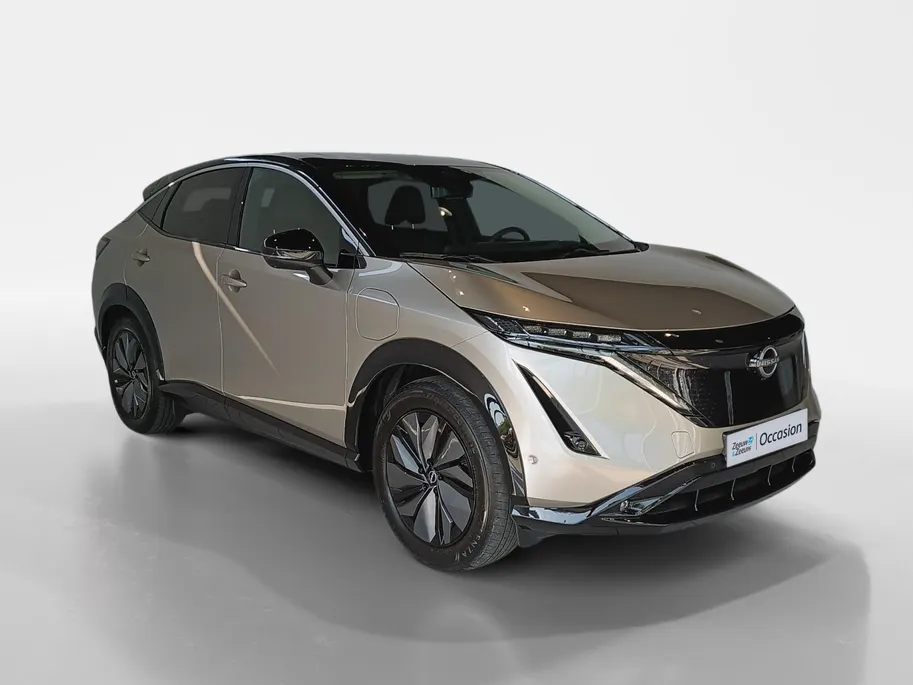 Nissan ARIYA Evolve 66 kWh | 22KW Lader| Afneembare trekhaak| Apple carplpay& Android auto| 360grd Camera| Stoelverwarming en verkoeling| Elektrisch verstelbare stoelen| Luxe bekleding| Dealer onderhouden|