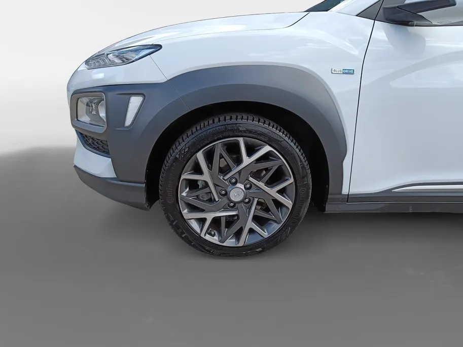 Hyundai Kona 1.6 GDI HEV Premium | Trekhaak | Apple Carplay/Android Auto | Adaptive cruise control | Dodenhoek herkenning | Leren bekleding
