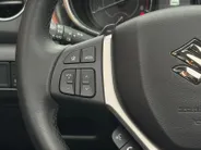 Suzuki Vitara 1.5 Hybrid Style 116PK AUTOMAAT SUNROOF! | Navigatie | Apple Carplay & Android Auto | Adaptive Cruise Control | Climate Control | Achteruitrijcamera | Parkeersensoren voor & achter | Stoelverwarming |