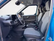 Ford E-Transit Cour. Limited 44 kWh | 1e eigenaar | Automaat | Trekhaak | Adapt. Cruise control | BLIS | Winter pack | Parkeersensoren voor en achter | Achteruitrijcamera | Navigatie | Apple carplay & Android auto | Fabrieksgarantie |