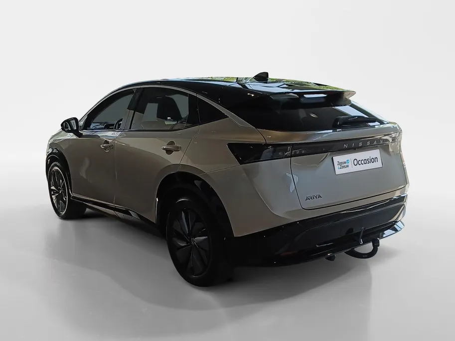 Nissan ARIYA Evolve 66 kWh | 22KW Lader| Afneembare trekhaak| Apple carplpay& Android auto| 360grd Camera| Stoelverwarming en verkoeling| Elektrisch verstelbare stoelen| Luxe bekleding| Dealer onderhouden|