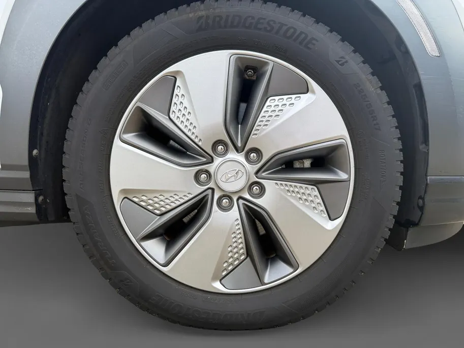 Hyundai Kona EV Premium 64 kWh | Achteruitrijcamera | Head Up Display | Dodehoek Detectie | Lederen Bekleding | Climate Control |