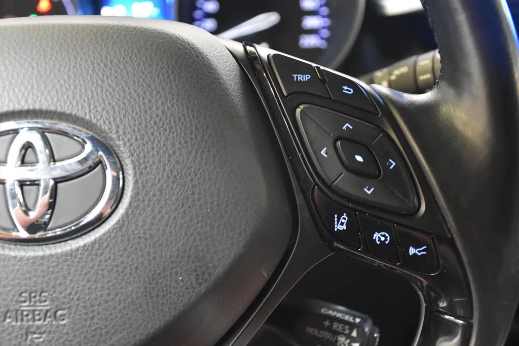 Toyota C-HR 1.8 Hybrid 122pk CVT Bi-Tone Navigatie | Cruise | Clima | PDC |Half Leer | Parlemoer Wit