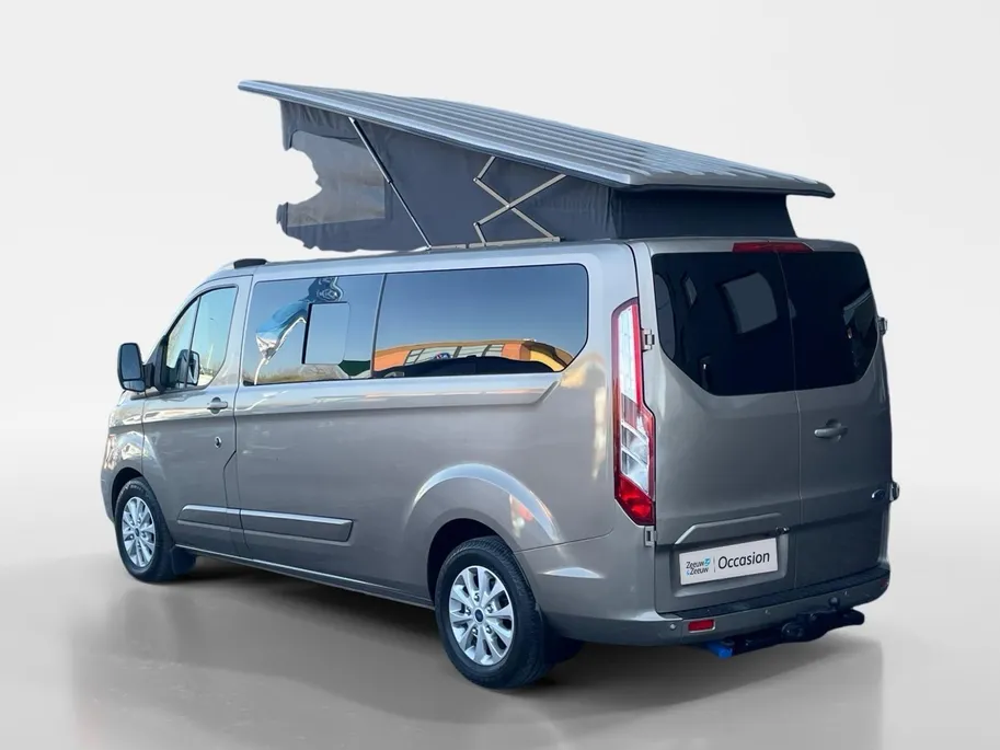 Ford Transit Custom Camper 170pk automaat | Keuken met gootsteen- koelkast- gasfornuis | Zonnescherm | Nieuwe distributieriem | Cruise control | Trekhaak | Extra opbergruimte | Stoelverwarming Transit Custom Camper 170pk automaat | Keuken met gootsteen- koelkast- gasfornuis | Zonnescherm | Nieuwe distributieriem | Cruise control | Trekhaak | Extra opbergruimte | Stoelverwarming