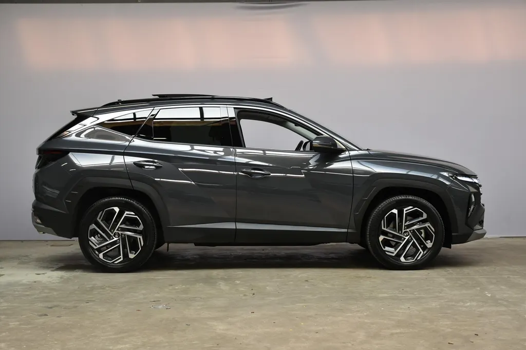 Hyundai Tucson 1.6 T-GDi HEV Aut. Premium Sky |Schuifdak |Beige Leder .