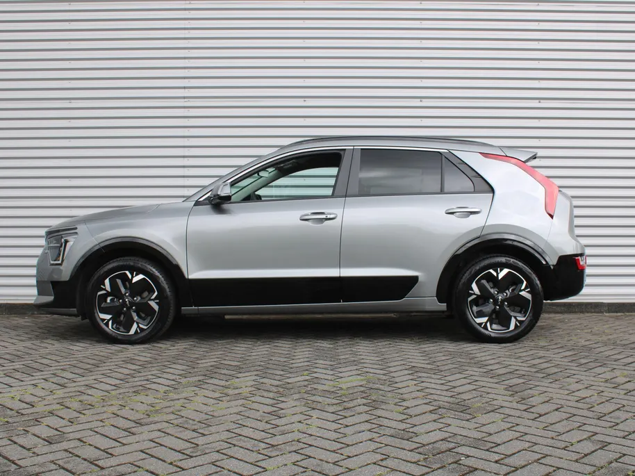 Kia Niro EV Edition Advanced 64.8 kWh | Stuur-/stoelverwarming | Elektr. stoelverstelling | Camera | Cruise adapt. | 17'LM | Clima | 17% bijtelling |