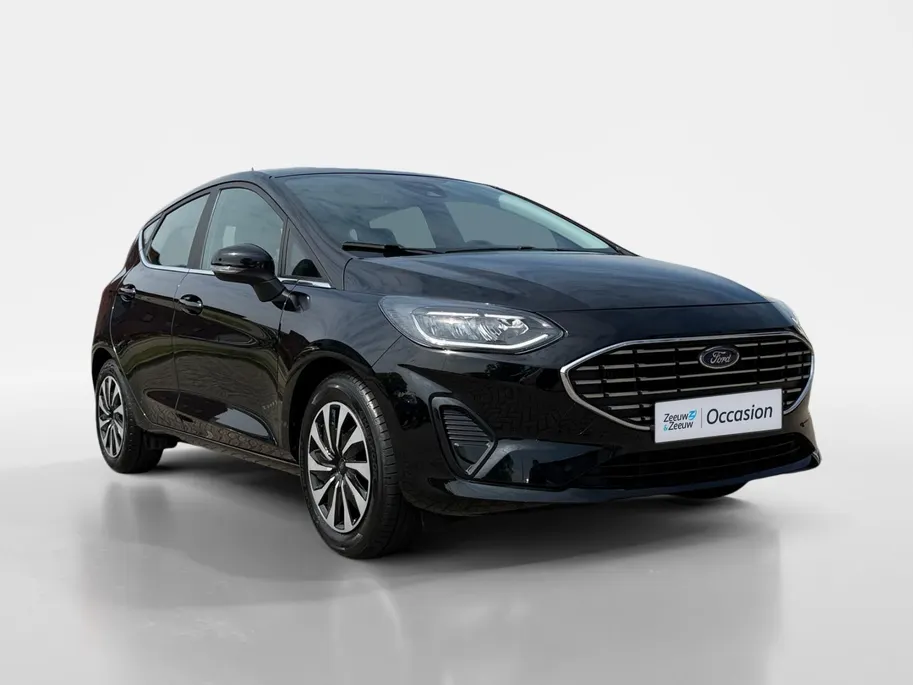 Ford Fiesta 1.0 EcoBoost Hybrid Titanium | Dealer onderhouden | NL auto | Winter pack | Parkeersensor achter | Navigatie via carplay | Apple carplay & Android auto | Cruise control | Bovag garantie |
