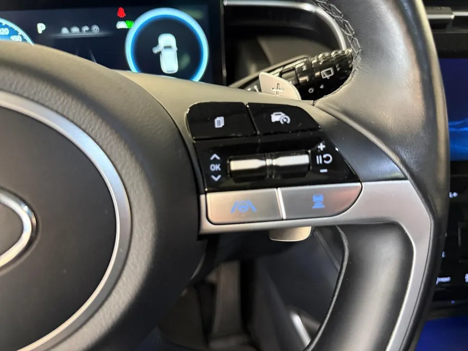 Hyundai Tucson 1.6 T-GDI PHEV Premium Sky 4WD | 66km WLTP elektrisch | Navigatie | Adaptive cruise control | Trekhaak | Apple Carplay & Android Auto | Dode hoek detectie | Draadloze telefoonlader |