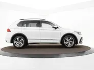 Volkswagen Tiguan 1.4 TSI eHybrid 245pk DSG R-Line Business · Camera · Inklap. Trekhaak · Dodehoeksensor · Parkeer Assistent · Stuur- & Stoelverwarming · 19'Velgen ·